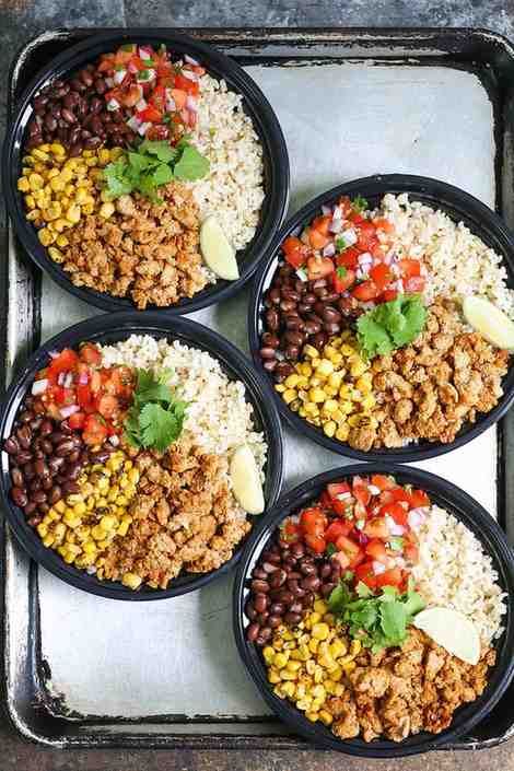 A meal prep container with a healthy burrito bowl